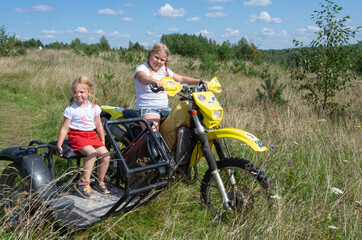 Children on motocross. Tver region, Russia. 