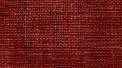 red linen texture, canvas fabric as background. close up red weaving or mesh fabric texture background. close up cotton or fabric fiber background.