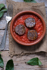 Rice blood sausage with tomato