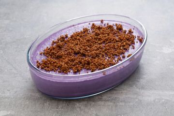 Obraz na płótnie Canvas homemade ube halaya( purple yam jam) topped with latik, filipino dessert