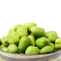 mini kiwi baby fruit (actinidia arguta) on white background 
