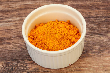 Tumeric powder in the bowl