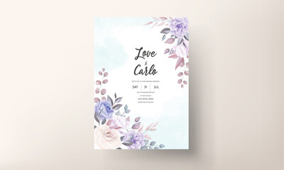 Beautiful wedding invitation card with purple flower ornament