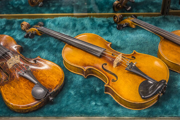 Fototapeta na wymiar Antique violins closeup