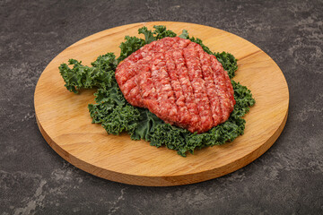 Raw beef burger cutlet for cooking