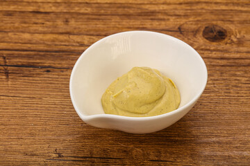 Dijon mustard sauce in the bowl