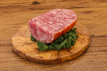 Beef ham piece over board