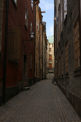 Fototapeta na wymiar Narrow street in old town of Stockholm, Sweden