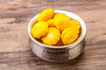Marinated patissons in the bowl