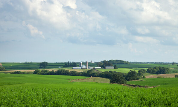 Rural landscape with farms and fields in southern Minnesota on a sunny afternoon
