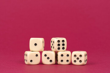 Six dice game on red background. Concept of luck and gambling game