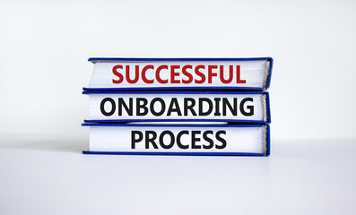 Successful onboarding process symbol. Books with words 'Successful onboarding process' on beautiful white background. Business and Successful onboarding process concept. Copy space.