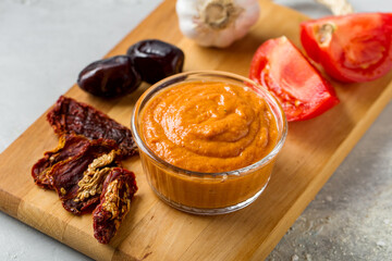 raw vegetarian delicious sauce made from tomatoes, dates, garlic, health content