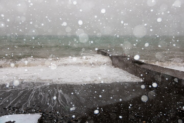 Storm on the Black Sea during a heavy snowstorm. Abnormal weather.