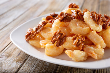 A view of a plate of honey walnut shrimp.