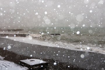 Storm on the Black Sea during a heavy snowstorm. Abnormal weather.