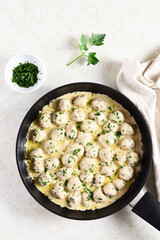 Swedish meatballs with white creamy sauce