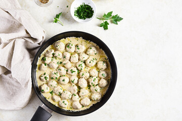 Swedish meatballs with white creamy sauce