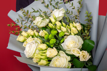 The girl with big bouquet of white flowers