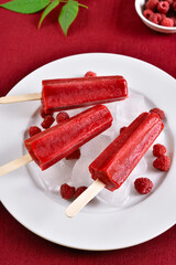 Raspberry ice cream popsicles