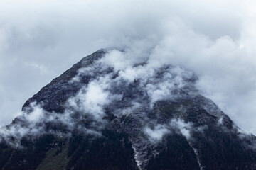 cloudy weather in the mountains, clouds over the peaks