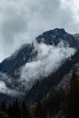 cloudy weather in the mountains, clouds over the peaks