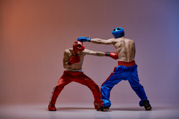 Jab of professional athletic fighter boxer, fighting guys in boxing gloves during sparring, martial...