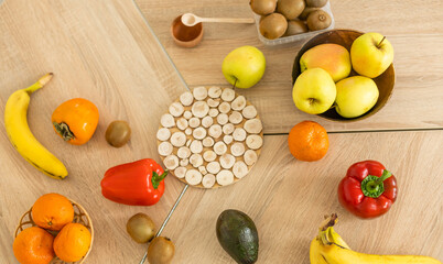 Closeup on table with vegetables in kitchen