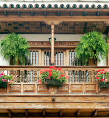 Fototapeta na wymiar Wooden balcony with flowers