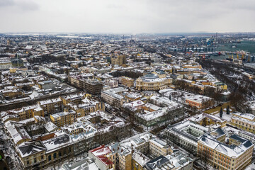 Fototapeta na wymiar Cityscape of Odessa with cargo port on right after snow blizzard on February 8, 2021.