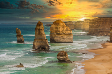 Sunset at the rock formations of The Twelve Apostles in Port Campbell National Park Victoria,...