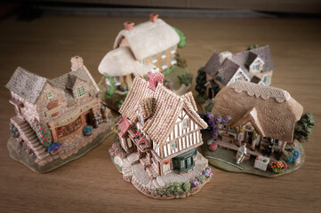 Collection of miniature ornament houses close together with depth of field