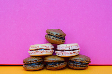 Homemade pink raspberry and chocolate macaron cookies