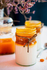 yogurt or cottage cheese with homemade sea buckthorn jam. Healthy breakfast. Low-calorie food.