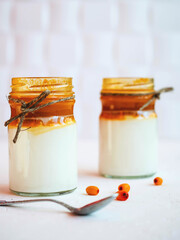 yogurt or cottage cheese with homemade sea buckthorn jam. Healthy breakfast. Low-calorie food.