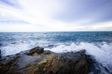 waves crashing on rocks
