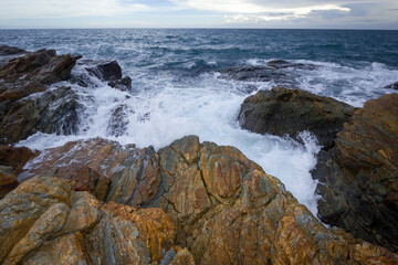 waves crashing on rocks