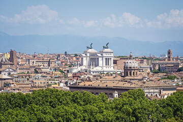 Fototapeta na wymiar Aerial panoramic landscape from Janiculum Hill of the historical center of Rome with the national monumet to Vittorio Emanuele II. Rome, Italy