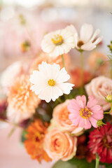 wedding ceremony is decorated with flower arrangements