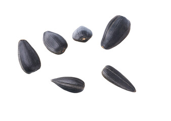Close-up of sunflower black seeds, isolated on white background.