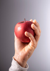 apple photography held by hand