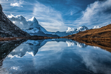 Panoramic view of Matterhorn peak, Switzerland..Matterhorn reflection in the Riffelsee.