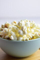 Closeup, popcorn in a bowl. Copy space.