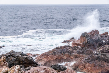 Fototapeta premium Storm Waves at Beautiful Rocky Coast.