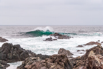 Fototapeta na wymiar Storm Waves at Beautiful Rocky Coast.