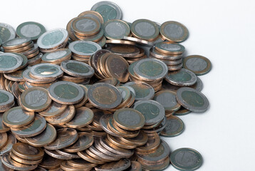 coins on a white background close-up, top view