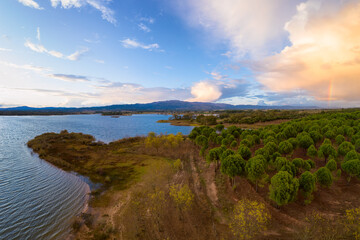 Lake drone aerial view of mountain panorama landscape at sunset in Marateca Dam in Castelo Branco,...