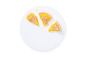 Traditional french lemon tart, top viewTraditional french lemon tart, with orange slice