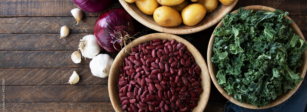 Wall mural beans, kale, garlic and onions banner