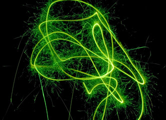 green abstract light streaks fireworks